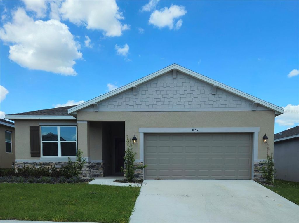 Photo of 1055 Patriot Loop, Haines City, FL 33844 (MLS # S5141959)