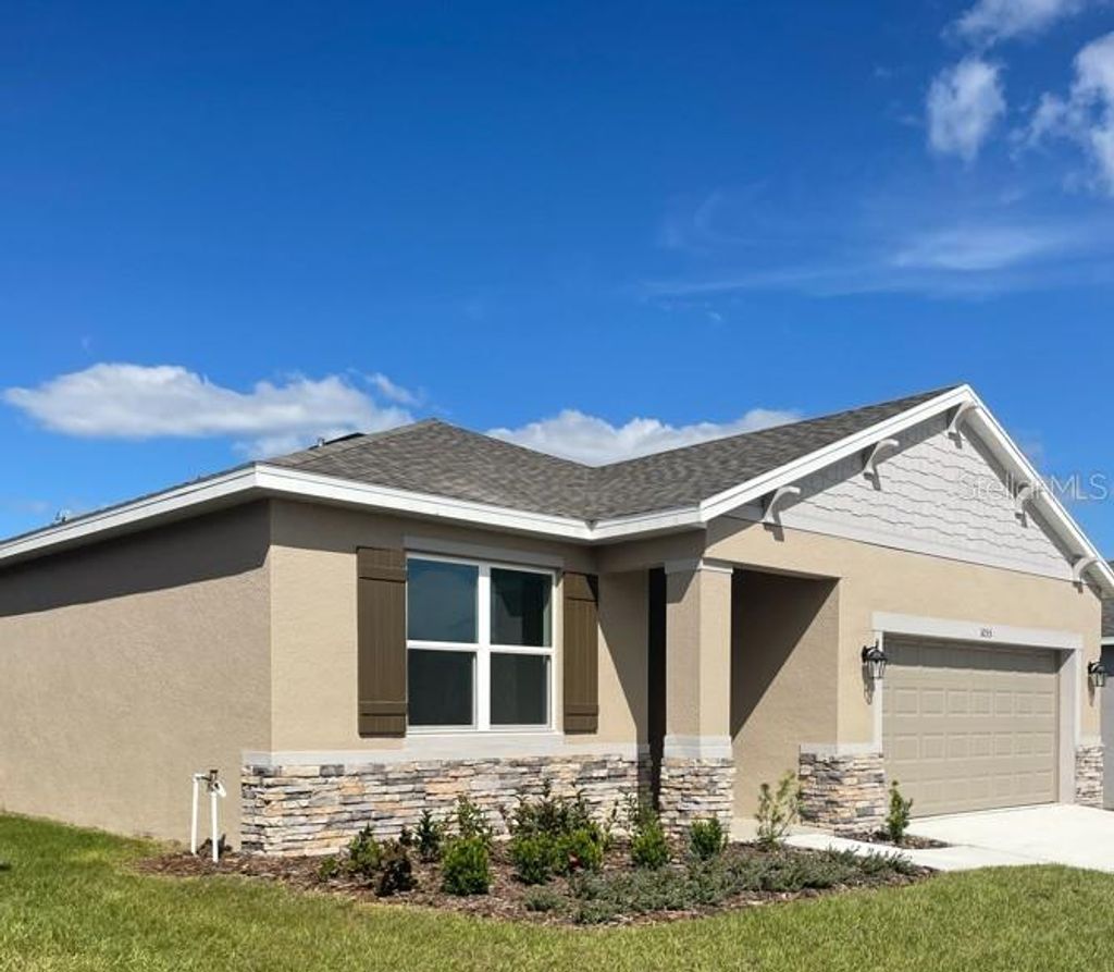 Photo of 1055 Patriot Loop, Haines City, FL 33844 (MLS # S5141959)