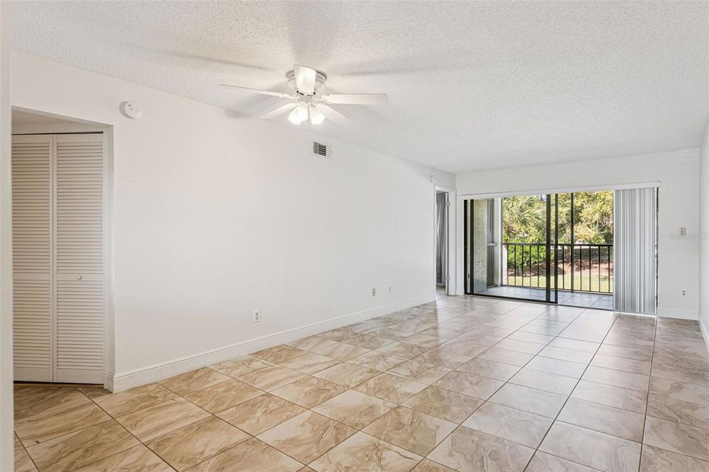 Photo of 3210 Candle Ridge Drive #203, Orlando, FL 32822 (MLS # O6363425)