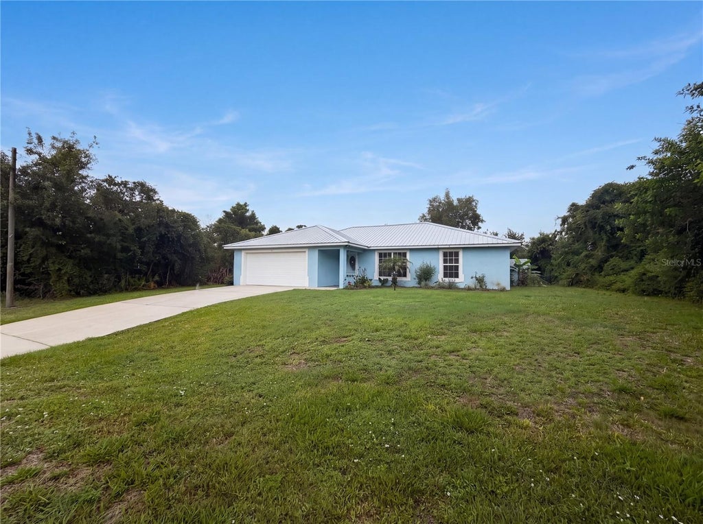 Photo of 259 Baltimore Way, Lake Placid, FL 33852 (MLS # O6430087)