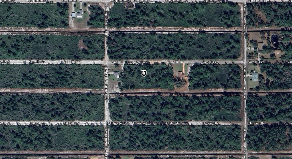 Photo of 619 Camellia Drive, Indian Lake Estates, FL 33855 (MLS # A4669814)