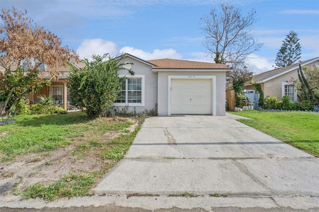Photo of 5235 Florida Holly Drive, Orlando, FL 32811 (MLS # O6410244)