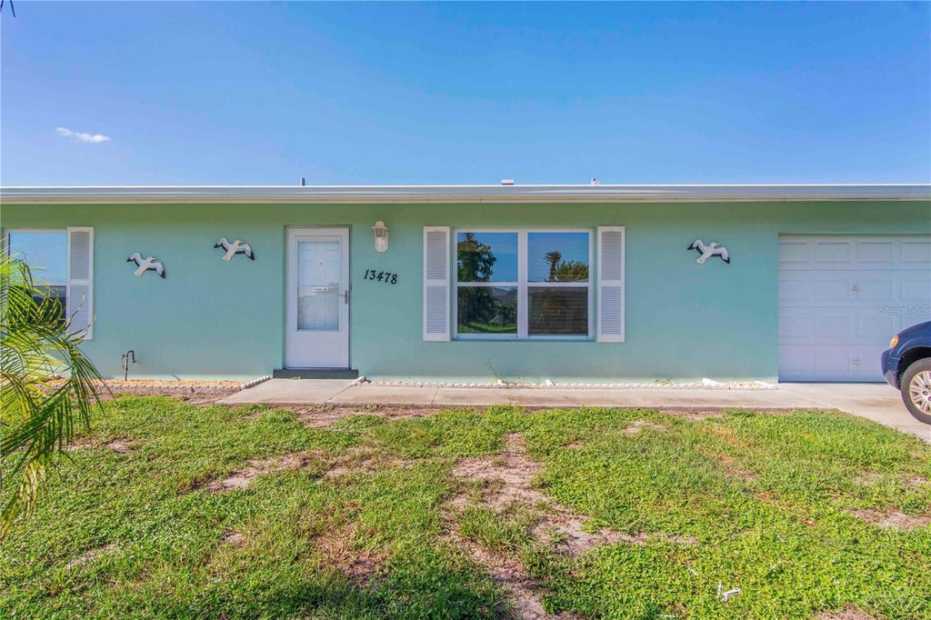 Photo of 13478 Santa Rosa Avenue, Port Charlotte, FL 33981 (MLS # C7530156)