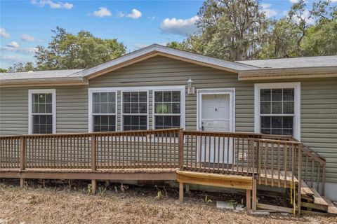 Photo of 240 Swan Lake Drive, Melrose, FL 32666 (MLS # GC531864)