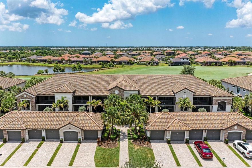 Offered as turn key! This beautiful veranda home in Lakewood National Golf Community has two bedrooms and two bathrooms, with a den/office that can easily be used as a third bedroom. The front lanai welcomes everyone into the home. The large family room has amazing views of the first hole on Lakewood National Golf Course, an Arnold Palmer-designed champion course. The kitchen is perfect for entertaining with the eat-in bar, kitchenette, granite counters, and beautiful cabinets. Next to the kitchen, enjoy the separate dining room for the perfect place to entertain your guests. The primary bedroom is large and bright, with a walk-in closet and a second closet. The primary bathroom has dual sinks and a walk-in shower. The second bedroom and bathroom are across the hall for added privacy. *All closets and pantry have custom California Closets. Finish the day on your backyard lanai with a view of the golf course and the sunsets. The resort-like activities are in close distance of this unit. They include a grand clubhouse, a 24-hour state-of-the-art fitness center with classes available with member, and 24-hour guard service. Enjoy a clubhouse with ongoing event schedules, a resort-style swimming pool, poolside dining, 8 lighted Har-Tru tennis courts, pickleball, Har Tru bocce courts, and a full-service spa. This home is in driving distance from some of the most beautiful beaches in the world, with top shopping and restaurants very close.