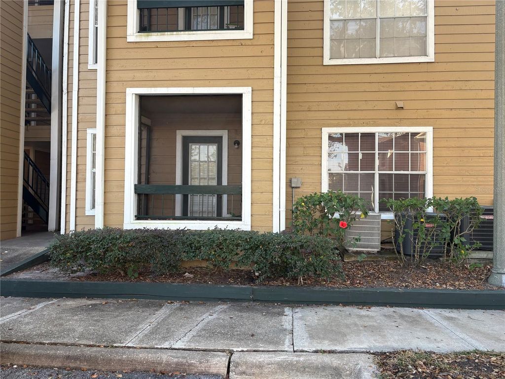 Photo of 5601 Rosebriar Way #106, Orlando, FL 32822 (MLS # O6404363)
