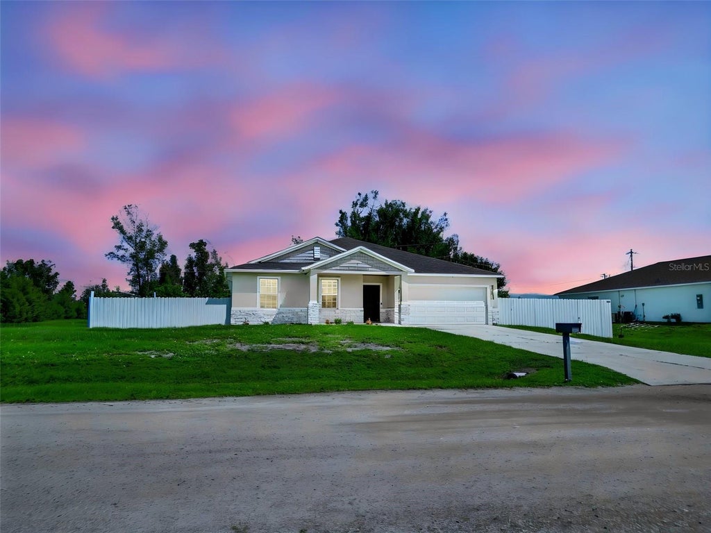 Photo of 805 Whispering Pines Road, Cape Coral, FL 33993 (MLS # TB8548330)