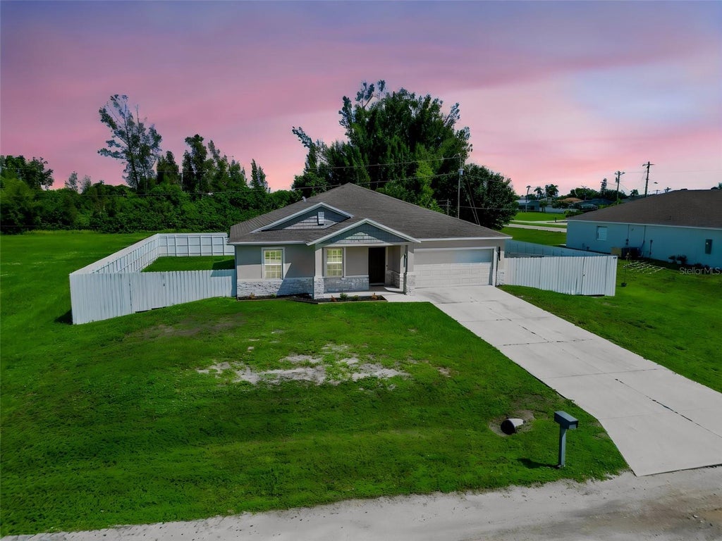 Photo of 805 Whispering Pines Road, Cape Coral, FL 33993 (MLS # TB8548330)