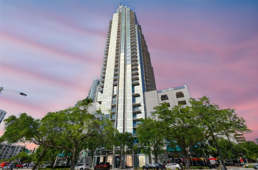 Welcome HOME! This 30th floor downtown condo provides 704 square feet of OPEN living space with 1 bedroom and 1 bathroom, LARGE kitchen to satisfy your inner chef, many UPDATES (A/C, All Kitchen Appliances, and disposal 2021, Washer/Dryer 2021, Refinished Hardwood Floors 2022, Nest Learning Thermostat 2024, Faucets 2025), and the 10-foot-tall FLOOR TO CEILING WINDOWS flood the space with natural light. With the bedroom and living room positioned on the wall of windows you can wake up to the views each morning and enjoy them again while relaxing in the evening. Step out onto your balcony to enjoy PANORAMIC VIEWS stretching from Old Tampa Bay, the Hillsborough River, Northern Suburbs, over to the Hard Rock Casino and State Fairgrounds in the distance. NO BLOCKED VIEWS HERE! The HOA includes MANY AMENITIES such as 24-Hour on-site concierge, secure building access, smart building access system syncs with your phone, included 1 Gig internet, package and delivery storage/security, gym, cardio room with NEW treadmills, pool deck overlooking Curtis Hixon Park with large pool and hot tub, grills, garden terrace, lots of lounge/entertaining space, outdoor fireplace tables, billiards room, kitchen, media room, and more! Located in the Riverside Arts District, you can easily walk to The Straz, Tampa Theater, Curtis Hixon Park, Art Museum, Julian B Lane Park, Armature Works, Benchmark International Arena, Tampa Convention Center, many restaurants, and everything else downtown provides! Perfectly located in growing downtown Tampa, don’t miss your opportunity to live in the heart of it all!