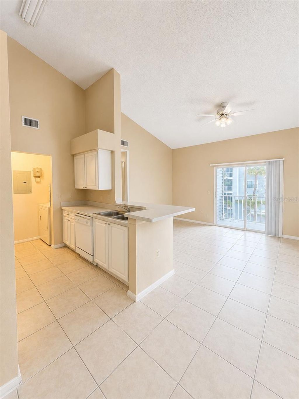 Photo of 1218 Bermuda Lakes Lane #201, Kissimmee, FL 34741 (MLS # O6428290)