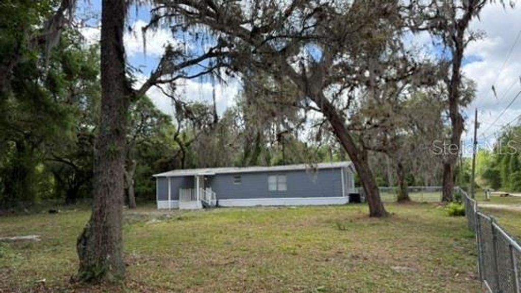Photo of 10920 Malati Street, New Port Richey, FL 34654 (MLS # O6398988)