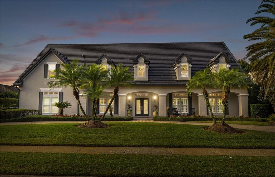 Welcome to this stunning 5-bedroom, 4-bathroom Jones-Clayton custom home 
spanning over 4,600 sq ft in the exclusive gated community of Cypress Point! 
Thoughtfully updated with over $200,000 in recent upgrades, including a new tile roof, 
new A/C units, new windows, and more, this home blends timeless craftsmanship with 
modern luxury. The gourmet kitchen has been completely remodeled and features 
custom cabinetry, quartz countertops, designer backsplash, WOLF induction cooktop, 
MIELE double oven with steamer, MIELE dishwasher, built-in microwave, and a dry bar 
with wine fridge. The kitchen and family room flow seamlessly to the lanai through 
French doors and sliding pass-through windows, creating the perfect setting for 
indoor/outdoor entertaining. The oversized first-floor primary suite offers a sitting area, 
French doors to the pool, a huge walk-in closet, and a fully remodeled spa-like ensuite 
with double vanities, a soaking tub, large walk-in shower, bidet, and exterior door to the 
lanai. A second bedroom near the primary suite includes built-in shelving and a desk 
area—ideal for a home office or nursery. Upstairs, you’ll find three additional spacious 
bedrooms, each with ensuite bathroom access, plus a large bonus room and a dedicated 
theatre room where the screen and short throw projector convey. There’s also an 18x11 
ft. under-air storage room perfect for seasonal décor, craft supplies, or sports 
memorabilia. The resort-style backyard is an entertainer’s dream with a large screened 
pool, outdoor kitchen, and dedicated gardening area. Additional highlights include high 
vaulted ceilings, 8-ft interior doors, recessed lighting, circular driveway, 3-car garage, 
and a private well for irrigation. The Cypress Point community is nestled on the Butler 
Chain of Lakes, offering a clubhouse, lighted tennis and basketball courts, fishing 
dock, kayak and paddleboard launch, playground, and walking trails. Located in the 
heart of Dr. Phillips, you’ll be minutes from top-rated schools, Restaurant Row world-class dining, 
shopping, and Orlando’s premier attractions. Luxury, location, and lifestyle — this Jones-
Clayton masterpiece truly has it all! Schedule your private showing today.