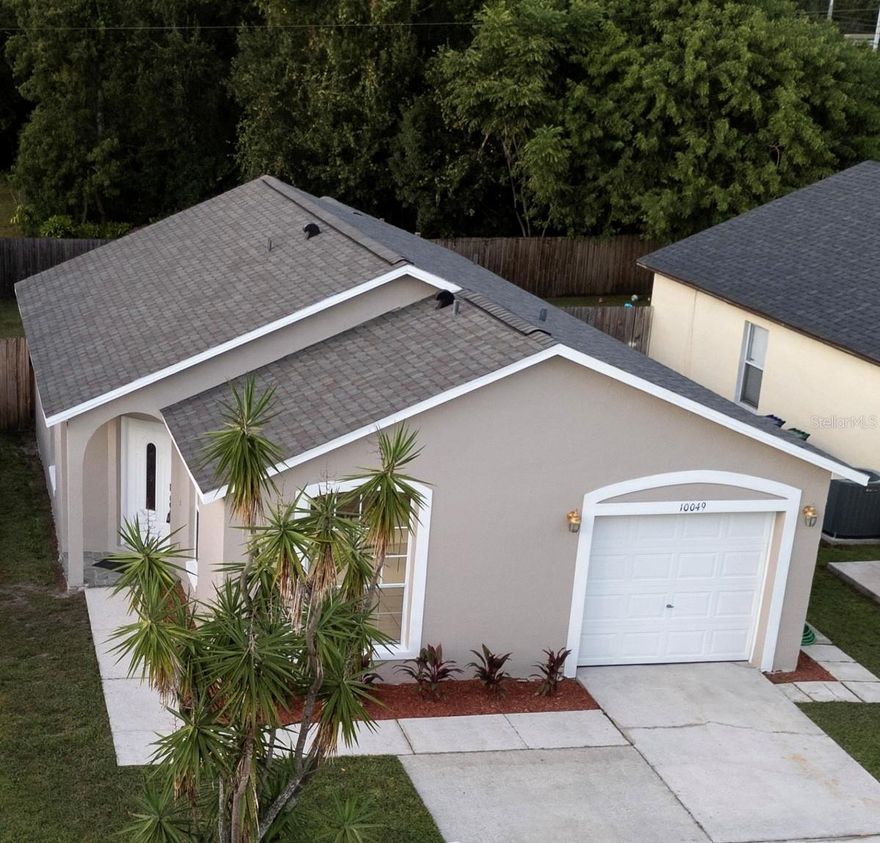Welcome to this beautifully updated 3-bedroom, 2-bath home in East Orlando. This move-in ready property offers a bright and open layout with modern finishes throughout. The renovated kitchen features white shaker cabinets, quartz countertops, stainless steel appliances, and a sleek black gooseneck faucet. The split-bedroom floor plan provides privacy and functionality, while both bathrooms have been tastefully remodeled with updated vanities, tile, and fixtures. The primary suite includes a double-sink vanity and a walk-in shower with elegant tile design. Fresh interior paint, modern lighting, and matte black hardware give the home a contemporary feel. Exterior highlights include a one-car garage, private fenced yard, and newly landscaped front yard for great curb appeal. Conveniently located near UCF, Valencia College, Waterford Lakes Town Center, and major highways 408, 417, and 528. No HOA. This home is perfect for first-time buyers, families, or investors seeking a turnkey property in a desirable Orlando location.