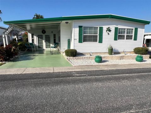 Photo of 575 Queen Palm Street, Largo, FL 33778 (MLS # TB8357249)