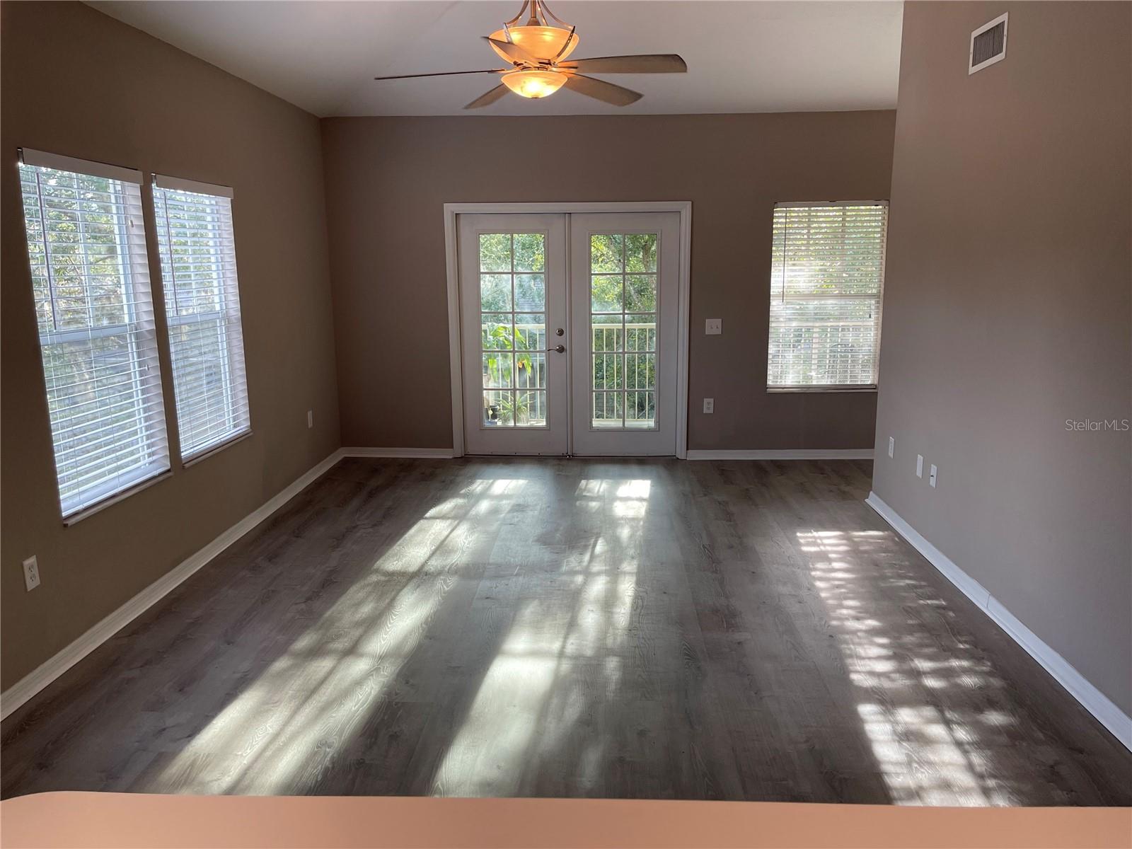 This condo offers the best of all Haile Village Center has to offer. Quiet condo building with parking. Unit includes a private balcony that overlooks 91st Ter. Close to coffee shops, store, restaurants, gyms and more. Spacious open floor plan with two full baths and private split bedroooms. Enjoy a sun-filled home with multiple windows.