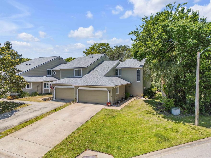 Welcome home to this beautifully updated end-unit townhome in desirable Ormond Beach! Perfect for first-time buyers, this spacious 2-story home offers flexible living with a loft that easily functions as a third bedroom, complete with a stunning oversized Murphy bed station and adjacent large storage room that can serve as a closet. The thoughtfully designed floor plan features the primary suite and bath downstairs for added privacy, while upstairs includes an additional bedroom, full bath, and versatile loft space. The fully remodeled kitchen is a showstopper with rich wood cabinetry, quartz countertops, updated lighting, and a stylish coffee/wine bar station perfect for entertaining. Enjoy Florida living year-round with the enclosed back porch, small private backyard, and screened garage space ideal for relaxing day or night. As an end unit, the home is filled with natural light from the abundance of windows. Located in a pet-friendly community with a community pool, this low maintenance lifestyle includes HOA-covered roof, siding, exterior paint, lawn care, basic cable, and internet. New roof installed January 2022 for added peace of mind. This move-in ready gem combines comfort, style, and convenience in one fantastic package!