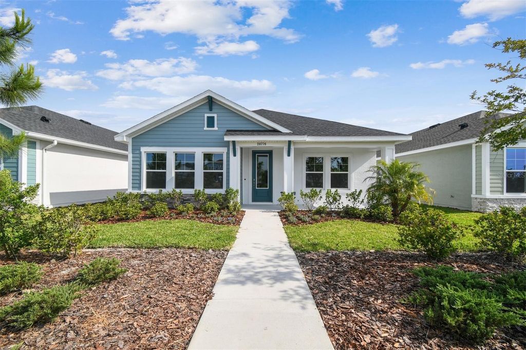 Photo of 28776 Rambutan Drive, Wesley Chapel, FL 33543 (MLS # TB8374832)