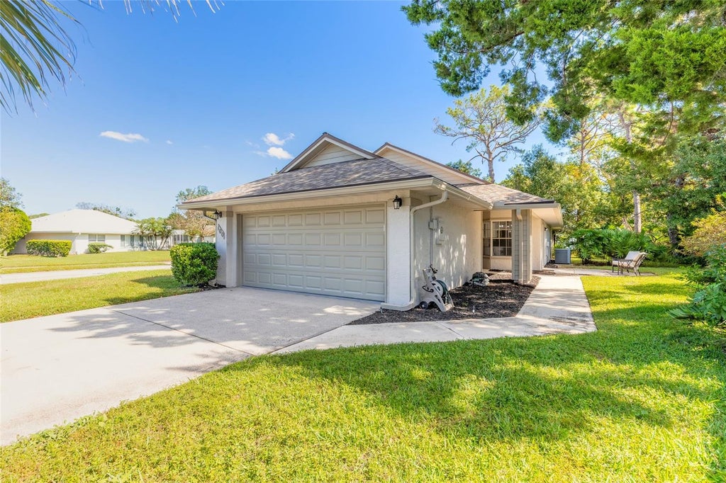 Photo of 100 Fiddlesticks Circle, Daytona Beach, FL 32114 (MLS # NS1089413)