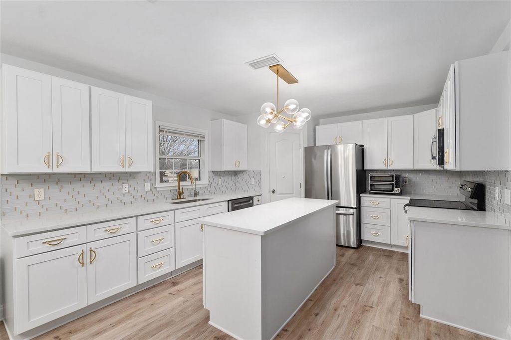 Photo of 944 NW 256th Terrace, Newberry, FL 32669 (MLS # GC537691)