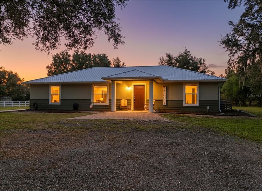 Your DREAM HOME AWAITS in DESOTO COUNTY! Looking for the perfect home on the perfect street in DeSoto County? Look no further — you’ve found it! Nestled on a beautifully manicured acre and surrounded by majestic oak trees, this solid concrete, energy-efficient 3-bedroom, 2-bath home combines comfort, safety, and style in one incredible package. This Home features an Open Floor Plan with high ceilings and expansive windows Spacious family room and a huge kitchen with upgraded stainless steel appliances, Sunny eat-in dining area, Split floor plan for added privacy, 4’ x 6” fireproof safe room (inside primary closet), Walk-in closets and custom plantation shutters, Beautiful stained concrete floors throughout, Glass vessel sinks and poured/stained concrete countertops in baths, Inside laundry room, Reverse osmosis water filtration system, Metal roof and double-insulated walls for superior energy efficiency, and Very low electric bills.The Outdoor Living is at its best here with Huge covered and screened lanai, New hot tub for relaxing evenings, Custom paver firepit area — perfect for gatherings, Pole barn with paver floor — ideal for RVs, golf carts, or extra vehicles, and Additional shed for storage. From the moment you arrive, you’ll be impressed by the quality craftsmanship, peaceful surroundings, and thoughtful upgrades throughout this home. Don’t miss out on this rare opportunity to own a truly one-of-a-kind property in DeSoto County. Schedule your showing today!