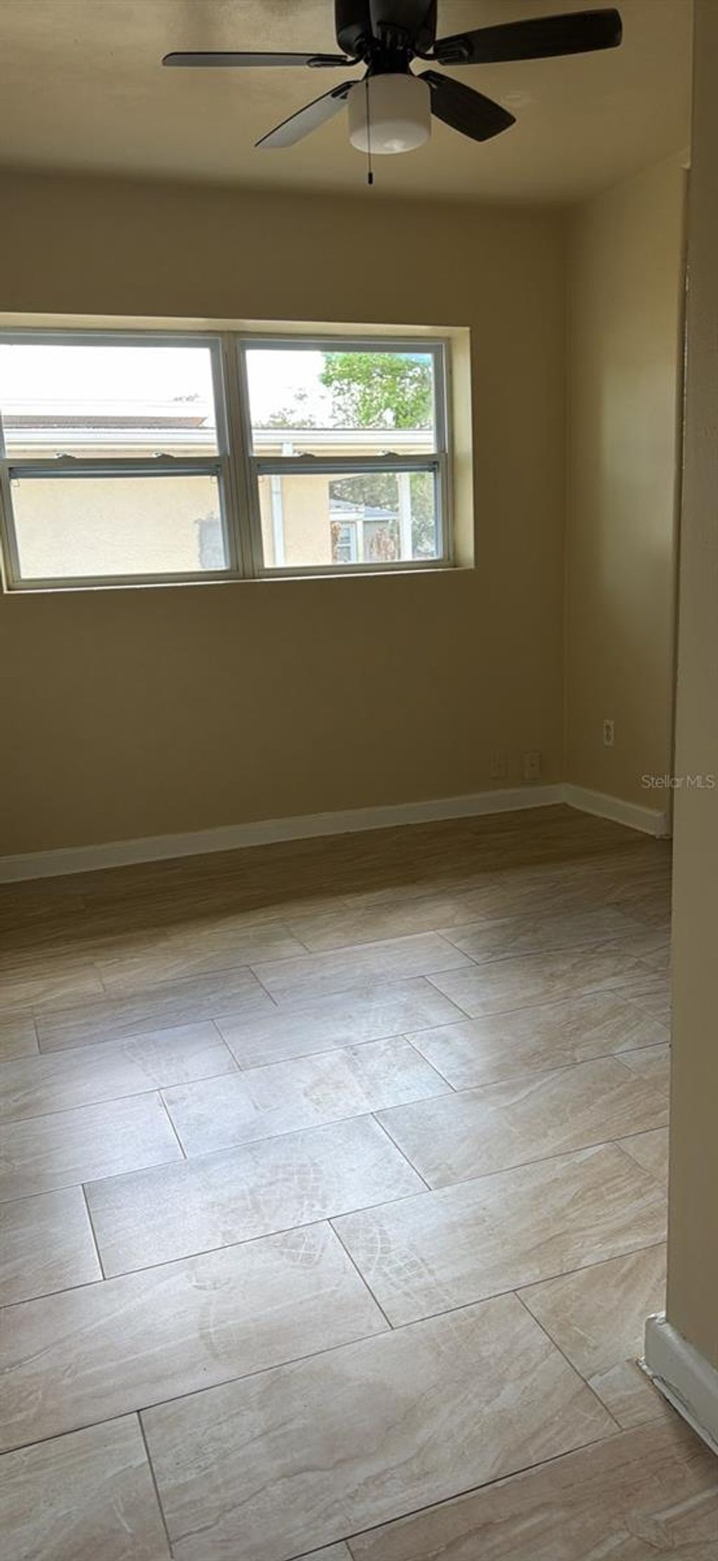 Photo of 811 S Randolph Avenue, Kissimmee, FL 34741 (MLS # O6398799)