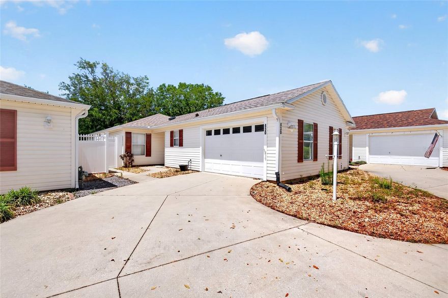 One or more photo(s) has been virtually staged. Looking for a 3-bedroom courtyard villa in The Villages near shopping and dining? This well-maintained Bonifay model in the Village of Belvedere offers a bright open layout with vaulted ceilings, luxury vinyl plank flooring, and a spacious kitchen plumbed for gas. Enjoy year-round living in the enclosed Florida room under heat and air, plus a private paver courtyard perfect for relaxing or entertaining. Major updates include roof (2020), HVAC (2019), and tankless water heater (2018). Ideal for full-time living, seasonal use, or investment.