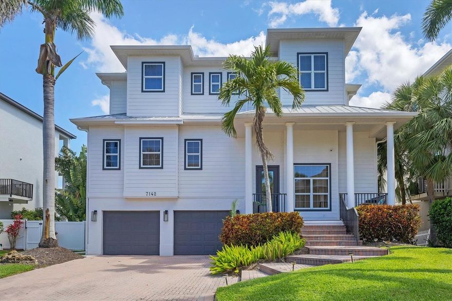 $100,000 Price Improvement! Key West-style custom-built 3-bedroom, 3.5-bath waterfront home located on deep water Crystal Canal in the gated community of Hawks Harbor. Metal roof and over $322,000 in renovations completed in 2022.
Layout includes a soaring-ceiling family room, a lower-level flex space with two additional storage areas, and an upstairs loft ideal for a home office, sitting area, or game room. All bedrooms are ensuite.
Kitchen features Zline and Decor appliances, Quartz countertops, stone backsplash, farmhouse sink, pantry closet, eat-in space, and a long island seating five. A whole-house water filtration system is included.
The master suite includes French doors to a private balcony, step ceiling, walk-in custom closet, double sink with decorative fixtures, large walk-in shower with rain head and body sprays, garden tub, and a stone feature wall.
Both secondary bedrooms feature tile flooring, walk-in closets, French doors to a balcony, and remodeled bathrooms with rain head and body spray showers.
Laundry room includes Samsung washer/dryer, sink, and storage cabinetry.
Outdoor amenities include a cozy front porch with composite decking, fenced backyard, spacious covered area, heated saltwater pool and spa with Pentair EasyTouch remote, putting green, Gardenia trees, grass yard with Invisible Fence.
23' new dock with water and electric plus a Jet Ski floating dock.
Major systems: 2021 water heater; HVACs replaced in 2020, 2021, and 2022.
Additional upgrades: luxury vinyl flooring, new interior and exterior paint, new front door, new main-level deck and stairs, new interior and exterior lighting including all new interior LEDs, new concrete sidewalk, impact glass, crown molding, paver driveway and walkway, wall/ceiling speakers, and freshly painted 26’ deep 2-car garage with ample storage.
Conveniently located minutes from downtown Sarasota and IMG Academy, with close proximity to Sarasota Airport, restaurants, shops, St. Armands Circle, and Gulf beaches.