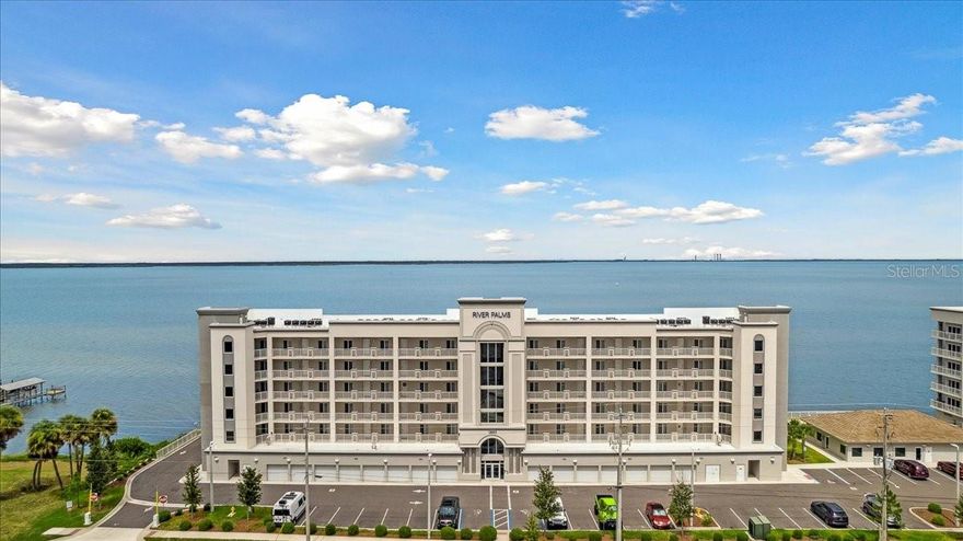 Waterfront living at its finest! Welcome to coastal luxury in this beautifully designed condo nestled along the scenic Indian River in Titusville, FL! Built in 2023, this modern residence offers breathtaking water views, stylish finishes, and low-maintenance living-all year round and just minutes from Kennedy space Center and beaches. Step inside to find a bright, open concept floor plan with high ceilings and abundant natural light. The contemporary kitchen features sleek shaker cabinetry, stainless steel appliances, granite countertops, tile backsplash and a bar height kitchen island perfect for entertaining. Light tile floors throughout enhances the coastal aesthetic and offers effortless upkeep. The primary suite offers private river views, a large walk-in closet, a spacious ensuite with double vanities and a walk-in tiled shower. This model has the guest bedroom located on the front side near the guest bath to offer privacy, or ideal for an office space.
With a front row seat to rocket launches you can enjoy your morning coffee or evening cocktails on your own private balcony overlooking the Intracoastal, where dolphins and manatees are frequent visitors. Beautiful plantation shutters and impact windows add to the safety and privacy. A covered parking spot inside the garage allows you to escape the Florida weather enter the lobby via garage!! Community amenities include a clubhouse, secure lobby, heated pool, fitness center, ground and building maintenance, and most utilities except electric! Whether you're looking for a full-time residence, snowbird retreat, or investment property, this move-in ready condo delivers style, comfort, an unparalleled access to Florida's Space Coast lifestyle. Close to restaurants, shopping, marinas, beaches, 528 and I 95, Orlando and NASA attractions! Don't miss your chance to own a piece of paradise in prestigious River Palms on Florida's beautiful east coast. Schedule your private showing today!