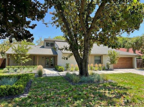 Photo of 7668 Pinemount Drive, Orlando, FL 32819 (MLS # O6384030)