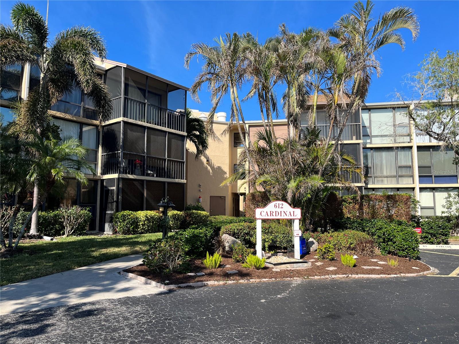 Price Adjustment!! This nicely maintained updated TURNKEY FURNISHED GROUND FLOOR condo located in the resort community of Bird Bay! This unit is close proximity to the clubhouse and all the amenities of a heated lap pool, tennis courts, pickleball courts, fitness room, library, and year-round clubs and activities! Tile flooring throughout, this flexible 2-bedroom 2 bath layout gives you the option to maintain the 2nd bedroom for guests or utilizing the extra space as an extension of your living space. The 2nd bath has an updated vanity and updated tiled walk-in shower. The primary has an en-suite bathroom with a brand-new vanity and tiled tub/shower combination and walk-in closet. The sliding glass doors off the living room lead to an enclosed covered screened outdoor sitting area. The AC was replaced in 2022 New Water Heater 2025 and the building has a new roof in 2023. There is an enclosed storage area outside for your bikes, and beach chairs. Conveniently located to the Legacy trail for walking and biking, minutes to Venice Beach, and Historic Downtown with shopping, entertainment, and dining. This condo is perfect for a seasonal retreat, income producing rental property, or your full-time residence! Come see it today, so you too can experience Florida living at its finest!