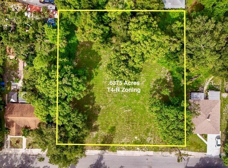 PREMIER 0.637-ACRE MULTI-FAMILY DEVELOPMENT OPPORTUNITY in Downtown Bradenton! Seize this rare 27,768 sq ft vacant lot zoned T4-R (Residential General Urban) for high-density multi-family development. Located in the heart of Bradenton’s vibrant urban core—just a 7-minute walk to LECOM Park, a 15-minute drive to Gulf Coast beaches, and steps from top-rated Ballard Elementary School—this lot is a developer’s dream for a lucrative multi-family project. KEY FEATURES: Flexible T4-R Zoning: Supports multi-family residential (apartments, condos, townhomes) with a maximum allowable density of up to 25 units per acre (approximately 15–16 units on 0.637 acres, subject to site design and city approval), offering significant development potential. Preliminary plans for an 8-plex included to jumpstart your project. Expansive Lot Size: At 0.637 acres, this lot provides ample space for a high-demand multi-family development—ideal for rental income or resale in Bradenton’s thriving market. Unbeatable Location: Minutes from downtown Bradenton’s shops, restaurants, and cultural attractions, with no HOA restrictions for maximum flexibility. HIGH & DRY in X Flood Zone for added peace of mind and potential cost savings. Proximity to Ballard Elementary School enhances appeal for family-oriented residences. Development-Ready: Cleared lot with utilities nearby (buyer to verify), poised for immediate development in a walkable, urban neighborhood. Capitalize on Florida’s booming multi-family demand with this T4-R zoned lot, offering up to 15–16 units of potential and ready-to-go 8-plex plans. Perfect for developers or investors seeking a high-return project in a prime location. Schedule a viewing or request the 8-plex plans today! All development details and zoning permissions should be independently verified with the City of Bradenton. Buyer is responsible for all due diligence.