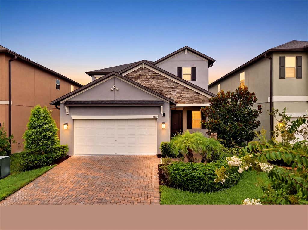 Photo of 9807 Wild Begonia Loop, Land O Lakes, FL 34637 (MLS # TB8535252)