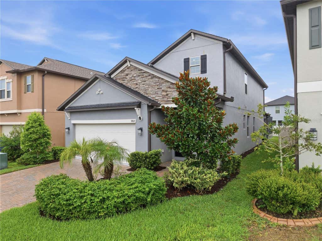 Photo of 9807 Wild Begonia Loop, Land O Lakes, FL 34637 (MLS # TB8535252)