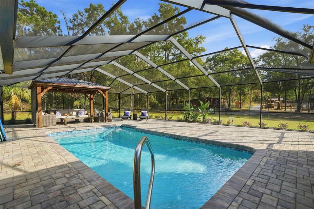 Photo of 16000 Sam C Road, Brooksville, FL 34613 (MLS # W7882070)