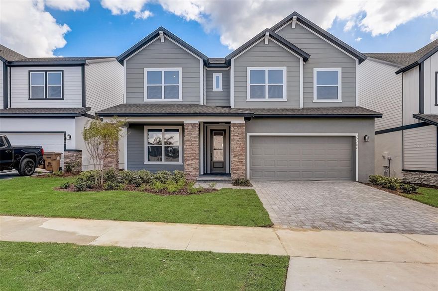 The Valleydale is a spectacular plan that will adapt well to your family's lifestyle changes throughout the years. There is plenty of well-purposed space for growing personalities to shine! The chef's kitchen consists of all upgraded stainless steel GE kitchen appliances and offers both a breakfast nook and a separate, formal dining area. Cherish Florida's beautiful outdoor living and lovely breezes under the shaded bliss of your extended lanai with sliding glass doors overlooking green space. The primary bedroom provides a glamorous way to begin and end each day with a spa-day bathroom and a luxurious walk in closet. The secondary bedrooms evoke individual privacy for all who reside or visit.  Come see for yourself why Clermont is one of the fastest growing areas in Central Florida!