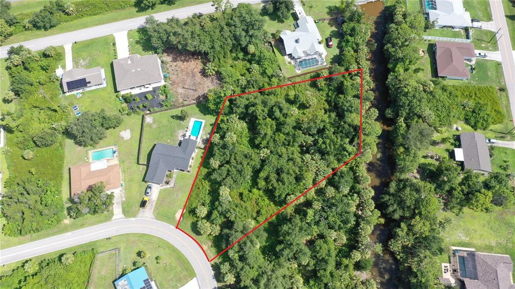 Photo of 284 Hinton Street, Port Charlotte, FL 33954 (MLS # C7513525)