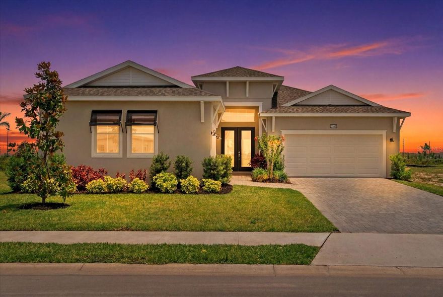 Welcome to luxury living in the highly sought-after SEAIRE Lagoon Community! This stunning DRB Homes semi-custom Eider model showcases the rare upgraded 4-bedroom floorplan, offering incredible flexibility for a guest suite, home office, playroom, or flex space to fit your lifestyle. Perfectly positioned on a premium water-view lot with no neighbors on one side or behind, this home offers exceptional privacy, breathtaking views, and a truly elevated living experience, priced to sell and BELOW the pricing of the builder’s model.
Why wait months for new construction when this fully completed, move-in-ready home is available now and loaded with countless custom upgrades? Inside, you’ll find luxury vinyl plank flooring throughout the entire home, designer lighting in the kitchen and dining area, custom built-in cabinetry in the laundry room, top-tier finishes, and a striking modern design aesthetic throughout. The expansive French-style sliding glass doors perfectly frame the stunning water views while filling the home with natural light.
The oversized 3-car garage includes a unique side-load separate garage ideal for a golf cart, bikes, storage, workshop, additional vehicle, or even a future game room conversion.
SEAIRE is one of the area’s most exciting new communities, featuring a spectacular 4.5-acre crystal lagoon opening this summer with a future restaurant and bar, EV golf cart paths, scenic walking trails, and resort-style amenities designed for everyday vacation living. Get in now and enjoy the lagoon before the school year begins!
Located in a prime commuter-friendly location with convenient access to Tampa, St. Pete, and Lakewood Ranch, this home delivers the perfect combination of luxury, location, lifestyle, and value.
Better than new construction, this home includes all the benefits of a brand-new build WITHOUT the wait, PLUS it is still under builder warranty. Homes with this level of upgrades, lot quality, and pricing rarely become available. Schedule your private showing today!