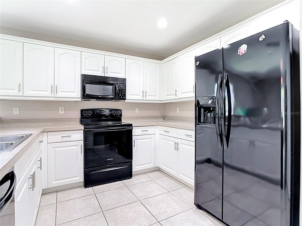 Photo of 35 Mark Twain Lane, Rotonda West, FL 33947 (MLS # D6137991)