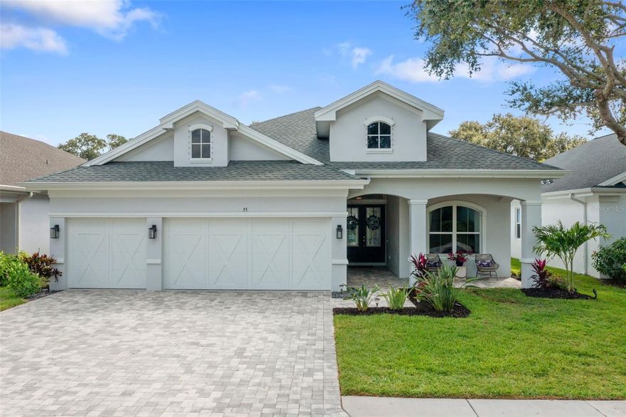 Luxury, lifestyle, and lasting quality come together in this breathtaking newer construction block pool home in the exclusive gated community of Dunedin Cove.

From the moment you arrive, you’ll feel the difference. This home features 4 bedrooms, 3 full baths.  A brick paver driveway and manicured landscaping set the stage, leading to grand double entry doors that open into a dramatic foyer with soaring ceilings and a sense of elegance that carries throughout the home.

Inside, every detail has been crafted with sophistication—from engineered hardwood floors and crown molding to walls of natural light and soft recessed lighting. The open layout flows seamlessly, anchored by a gourmet chef’s kitchen with quartz countertops, 42-inch shaker cabinetry, Sub-Zero refrigerator, and an oversized island that’s as functional as it is stunning. The adjoining great room features custom built-in shelving and a sleek electric fireplace, offering both warmth and style.

The owner’s suite is a retreat of its own, complete with two designer walk-in closets and a spa-worthy bath with quartz counters, a deep garden tub, and a separate shower. Sliding doors reveal the ultimate outdoor escape: a brand-new saltwater pool with shimmering finishes, framed by a screened lanai. Whether hosting lively gatherings or enjoying peaceful mornings, this private oasis is designed for year-round enjoyment.

Three additional bedrooms provide flexibility for family, guests, or office space, while upgrades such as radiant barrier insulation, natural gas with pre-plumbing, a Tesla wall charger, and a whole-house generator add modern comfort and peace of mind. A spacious three-car garage completes the home.

Not in a flood zone and nestled in a golf cart–friendly gated enclave, this property is just minutes from Downtown Dunedin’s waterfront parks, shops, craft breweries, and festivals—with award-winning beaches and Tampa International Airport only a short drive away.

This isn’t just a home—it’s a lifestyle masterpiece designed for those who value luxury, quality, and the very best of Florida living.