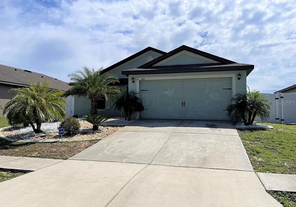 Photo of 660 Swallowtail Drive, Haines City, FL 33844 (MLS # O6388670)