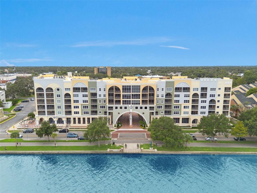 Experience elevated living in this exceptional 4 Bedroom/4 Bathroom Penthouse perched atop the desirable Gateway at Riverwalk Community, offering panoramic views of beautiful Lake Monroe in the heart of Historic Downtown Sanford. Boasting nearly 3,300 sq ft of open concept living, this residence is the epitome of modern elegance and timeless charm. Step inside to a light filled layout with soaring ceilings, stylish Plantation Shutters, and Expansive Stackable Hurricane Resistant Sliding Glass Doors (Installed 2024) that flood the space with natural light and frame breathtaking lakefront views. The Gourmet Kitchen flows seamlessly into spacious living and dining areas, ideal for both relaxing and entertaining. Two Primary Suites feature spa inspired bathrooms with walk-in showers, soaking tubs, and generous walk-in closets, providing comfort, privacy, and luxury. Additional highlights include: Luxury Vinyl Plank Flooring throughout the living area, with tile in kitchen, entry way, and bathrooms. Private Screened Balcony overlooking Lake Monroe. Second Screened Lanai with view of Charming Downtown Sanford. Abundant Storage and generously sized bedrooms. New Refrigerator (2024), Tankless Water Heater (2025) for Energy Efficiency, Frameless Shower door added in third Bathroom (2025), New Lanai Screens (2025). As a resident at Gateway at Riverwalk, you will enjoy a low maintenance lifestyle with premium amenities covered by the HOA. Including: High speed Internet & Cable, Water, Sewer, Trash, and Pest Control. Exterior A/C maintenance and rooftop unit replacement, Building and Ground Maintenance. The community also features a Clubhouse that hosts resident events and private gatherings, plus a fully equipped Fitness Center. INCLUDED: with the purchase of this condo is One Garage Space (#19) and One Covered Parking Space (#50) for your convenience. Enjoy being just steps away from Sanford's vibrant downtown. Home to an eclectic mix of Restaurants, Breweries, Cafes, Boutique Shops, and Lively Nightlife. Sanford is a cultural hub, known for popular annual events like Porch fest, Sofa and Suds Couch Racing, and the monthly Sanford Food Truck Fiesta, featuring 40 plus Top Food Trucks across Central Florida. Gateway At Riverwalk Isn't Just a Home, It's a Lifestyle. Don't miss your opportunity to own one of the most desirable Penthouses in one of Central Florida's most Historic and thriving Communities.