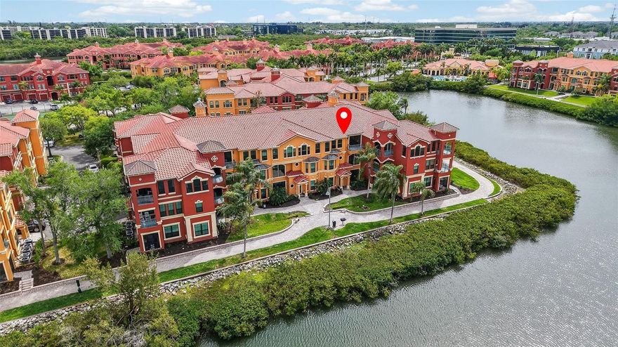 Experience elevated waterfront living in this beautifully updated top floor residence in the picturesque Grand Bellagio at Baywatch featuring 3 bedrooms and 2 bathrooms, soaring high ceilings, and breathtaking water views from every room. Step onto your private waterfront balcony to enjoy stunning sunsets and the natural beauty of manatees and dolphins often visible in the waters below. The open concept layout seamlessly connects the dining area, den, and kitchen, creating an inviting space for both everyday living and entertaining. The spacious primary suite includes a versatile additional space ideal for a private office or sitting area, all overlooking the water for a peaceful retreat. The en suite bathroom offers dual sinks, an updated shower, and a large soaking tub, providing both style and functionality. The second and third bedrooms are conveniently located near a full bathroom just across the hall, featuring an upgraded shower. A laundry closet with an included washer and dryer adds everyday convenience. The home also includes a one car garage, a premium and highly sought after feature within this waterfront enclave. Ideally situated within the community, this residence is just a short walk to the resort style pool and charming waterfront gazebo, making it effortless to enjoy the very best of coastal living. This gated setting offers a true luxury lifestyle with 24 hour manned security, providing both peace of mind and a strong sense of privacy. Residents enjoy an impressive collection of amenities including an elegant clubhouse, tennis courts, a resort style pool with cabanas, hot tub and sauna, fitness center, library, billiards room, and a scenic 1.2 mile lighted walking path. Additional highlights include a playground, a very dog friendly atmosphere, and docks currently being renovated, adding even more value to this exceptional waterfront opportunity.
.