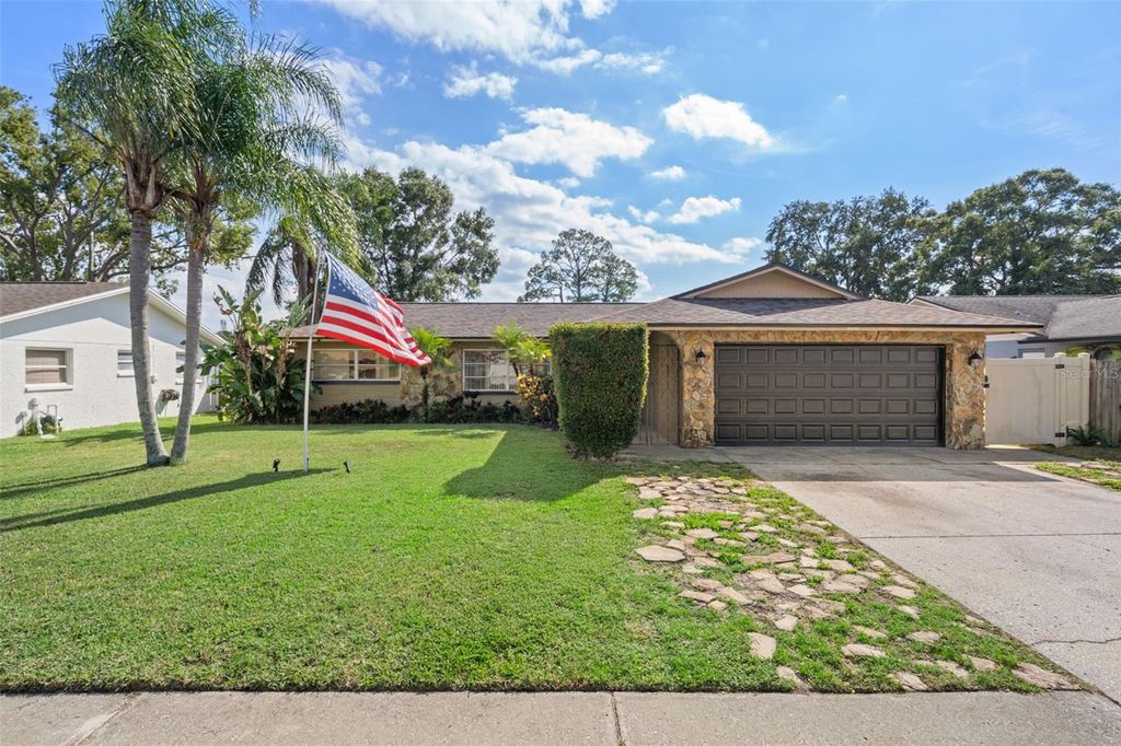 Photo of 1407 Garden Avenue, Tarpon Springs, FL 34689 (MLS # W7880144)