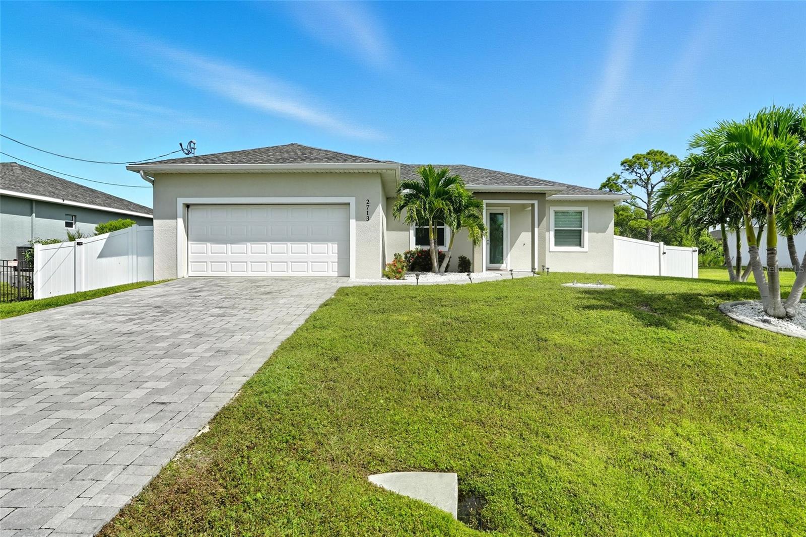 Welcome to 2713 SW Embers Terrace a stunning 3-bedroom, 2-bath home built in 2020 and nestled on an
oversized lot in one of Cape Coral's most sought-after neighborhoods. With nearly 2,000 sq ft of living space,
this residence offers a perfect blend of style, comfort, and functionality.
Step inside to soaring vaulted ceilings, impact-rated windows and doors, and a thoughtfully designed split
floorplan that maximizes privacy and flow. The open-concept kitchen is a showstopper, featuring a large island,
granite countertops, and ample cabinetry ideal for entertaining or everyday living.
The spacious primary suite is a true retreat, complete with a spa-inspired jacuzzi tub, granite double vanity,
and walk-in closet. Outside, enjoy a covered porch, lush landscaping, and a full irrigation system all designed
for effortless outdoor living.
Located minutes from shopping, dining, parks, and the Gulf's pristine beaches, this home offers the best of
Cape Coral living. Whether you're looking for a full-time residence, seasonal escape, or investment opportunity,
this property checks every box.