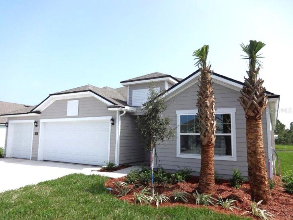 Photo of 49 Lumber Jack Trail, Palm Coast, FL 32137 (MLS # FC294539)