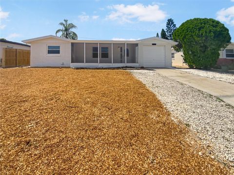 Photo of 4848 Colonnade Avenue, Holiday, FL 34690 (MLS # O6340883)