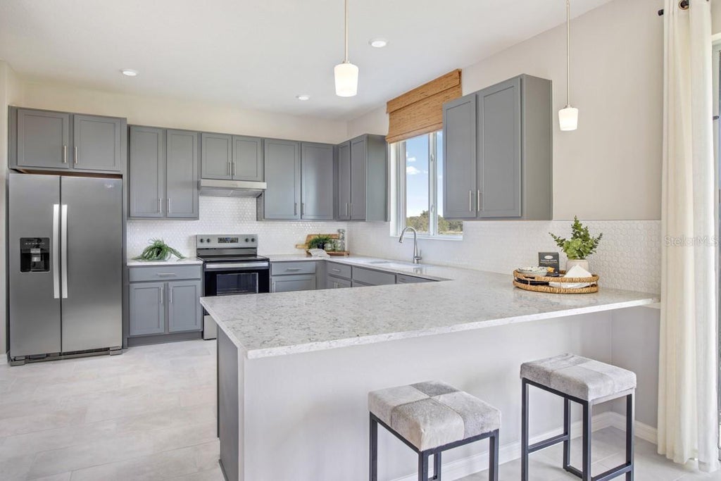 Photo of 3070 Crossland Court, Haines City, FL 33844 (MLS # O6448603)