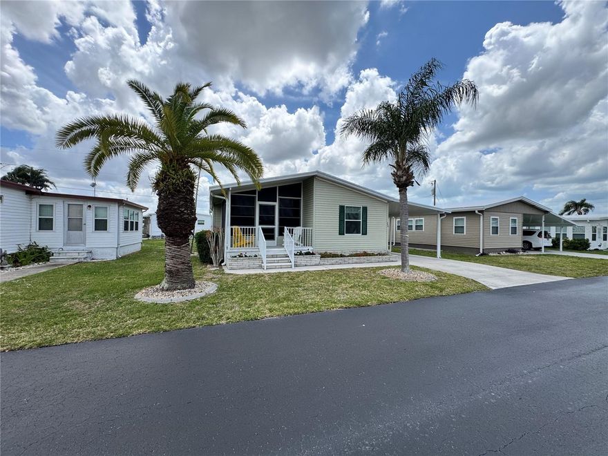 WELCOME TO WINDWARD ISLES – ONE OF SARASOTA’S MOST DESIRABLE RESIDENT-OWNED 55+ COMMUNITIES!

This WELL-MAINTAINED 2 BEDROOM, 2 BATH DOUBLE-WIDE HOME offers the perfect blend of comfort, convenience, and FLORIDA LIFESTYLE LIVING. Built in 2003 and featuring APPROXIMATELY 930 SQ FT OF HEATED SPACE, this home sits on a nicely sized lot with COVERED PARKING, A PRIVATE DRIVEWAY, AND ADDITIONAL STORAGE SHED.

Step inside to find a LIGHT AND BRIGHT FLOOR PLAN with LAMINATE FLOORING THROUGHOUT MAIN LIVING AREAS, a SPACIOUS LIVING ROOM, and a FUNCTIONAL KITCHEN equipped with CONVECTION OVEN, REFRIGERATOR, MICROWAVE, and more. The PRIMARY SUITE includes a WALK-IN CLOSET and EN-SUITE BATH, while the SPLIT BEDROOM DESIGN offers privacy for guests.

Enjoy your morning coffee or evening relaxation from MULTIPLE OUTDOOR SPACES INCLUDING A SCREENED PORCH, FRONT PORCH, AND REAR PATIO—perfect for taking in Sarasota’s year-round sunshine.

WINDWARD ISLES IS A LAND-OWNED CO-OP COMMUNITY offering residents access to a HEATED COMMUNITY POOL, RECREATIONAL FACILITIES, AND A FULL CALENDAR OF SOCIAL ACTIVITIES. The LOW HOA FEE (APPROX. $178/MONTH) INCLUDES WATER, TRASH, LAWN MAINTENANCE, AND COMMUNITY AMENITIES, making this an EXCEPTIONAL VALUE.

Ideally located just minutes from SHOPPING, DINING, MEDICAL FACILITIES, AND WORLD-FAMOUS GULF BEACHES, this property offers both PEACEFUL COMMUNITY LIVING and EASY ACCESS TO EVERYTHING SARASOTA HAS TO OFFER.

Whether you're looking for a SEASONAL RETREAT or a FULL-TIME RESIDENCE, this home is a fantastic opportunity to own in a HIGHLY SOUGHT-AFTER COMMUNITY.

SCHEDULE YOUR PRIVATE SHOWING TODAY.