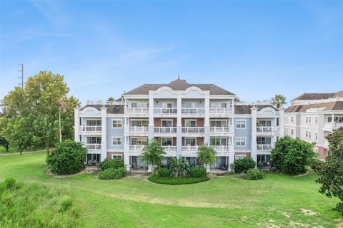 Photo of 1100 Sunset View Cir #402, Reunion, FL 34747 (MLS # O6443433)