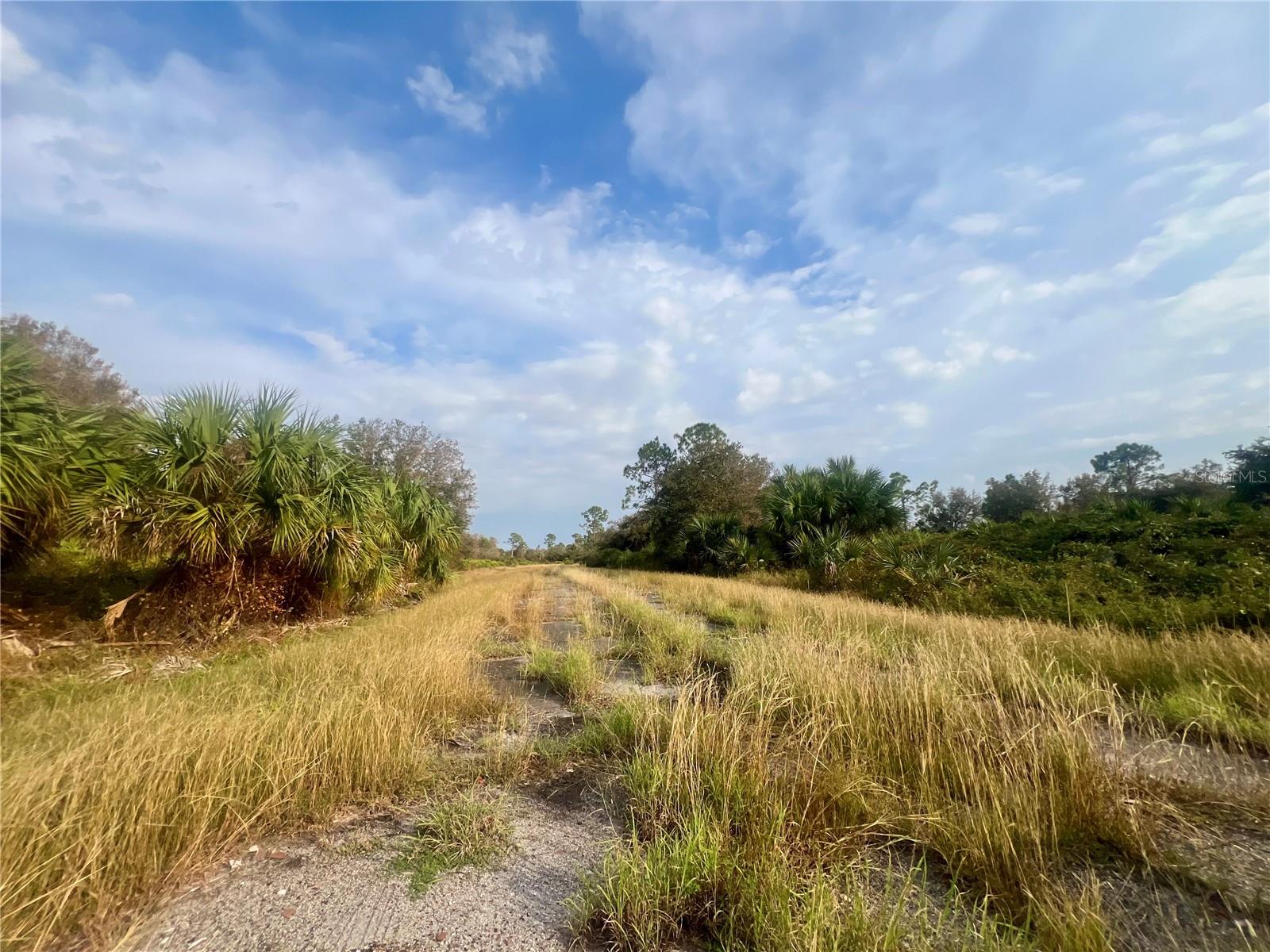 Beautifull lot offers a unique opportunity to build the home of your dreams, Situated in Port Charlotte a quiet area, this land boast panoramic views and convenient location close to local amenities. With ample space to design and build, this lot is perfect for those looking to create their own personal paradise. Don't miss the change to turn the space this land into your HOME!!